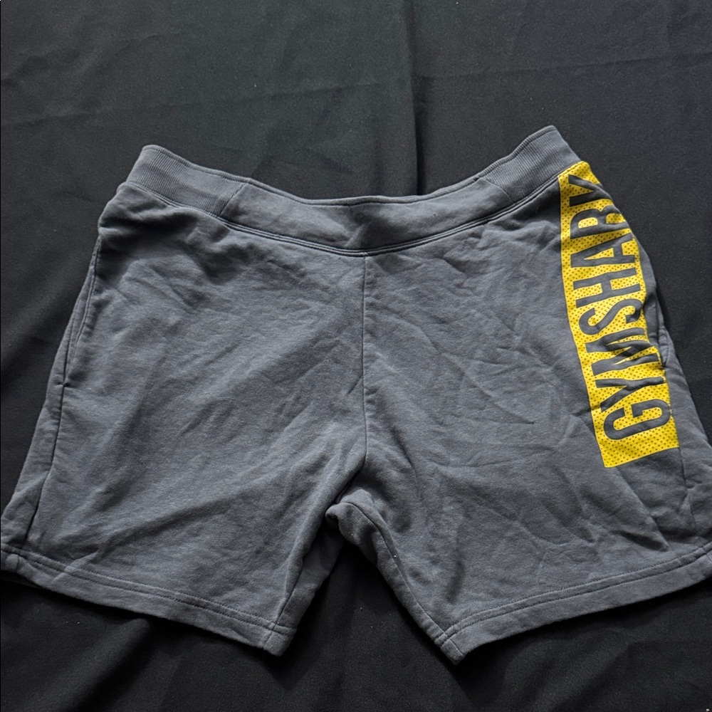 Gymshark Charcoal Shorts with Vibrant Yellow Logo
